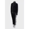 Sports suit with stripes