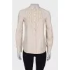 Light beige blouse with ruffles