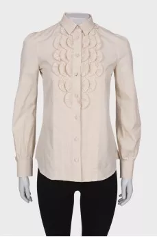 Light beige blouse with ruffles