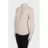 Light beige blouse with ruffles