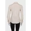 Light beige blouse with ruffles