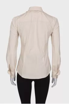 Light beige blouse with ruffles
