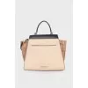 Trapezoidal bag in leather