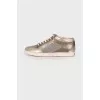 Gold glitter sneakers