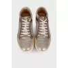 Gold glitter sneakers