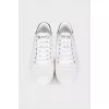 Patent sneakers with brand logo