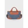 Denim bag with leather trim