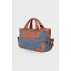 Denim bag with leather trim