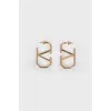 Gold tone logo earrings