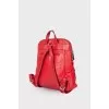 Red backpack with silver hardware