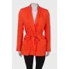 Orange jacket on the belt