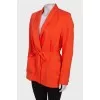 Orange jacket on the belt