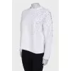 White sweatshirt with appliqué