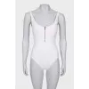 White swimsuit with tag