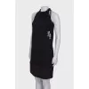 Black dress with ties and pearls