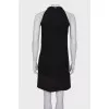 Black dress with ties and pearls