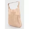 Perforated leather bag