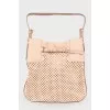 Perforated leather bag