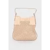 Perforated leather bag