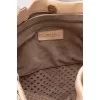 Perforated leather bag