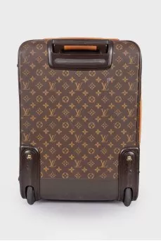 Monogram Pegase suitcase