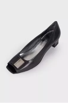 Decorated black leather shoes