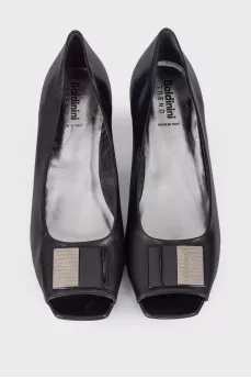 Decorated black leather shoes