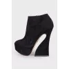 Suede ankle boots with figured heels