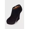 Suede ankle boots with figured heels