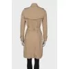 Beige double-breasted trench coat