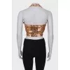 Top in print embroidered with sequins