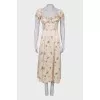 Beige dress with ruffles