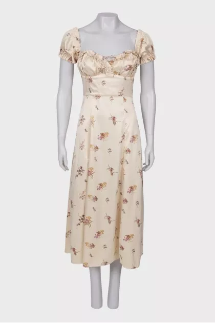 Beige dress with ruffles