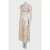 Beige dress with ruffles
