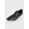 Men's black leather sneakers
