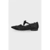 Openwork ballerinas with a bow