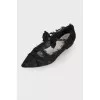 Openwork ballerinas with a bow
