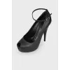 Peep-toe leather pumps