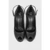Peep-toe leather pumps