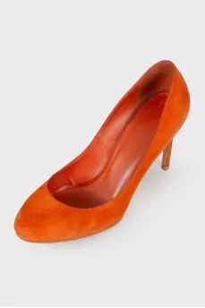 Orange suede pumps