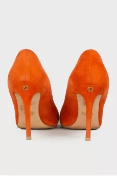 Orange suede pumps