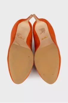Orange suede pumps