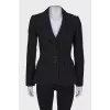 Black jacket decorated with pink thread