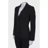 Black jacket decorated with pink thread