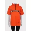 Orange hoodie with shortened sleeves 