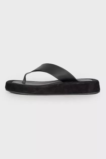 Black leather slippers