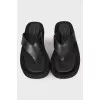 Black leather slippers