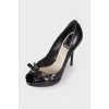Peep-toe leather pumps