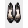 Peep-toe leather pumps