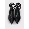 Lacquered ballerinas with a strap